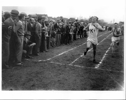 Track Runners at Finish Line