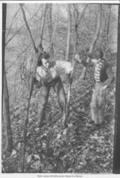 Woman and Boy in Woods