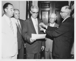 N. Emerson Paton Presenting Certificates