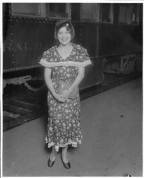 Woman Standing Next to Train Car