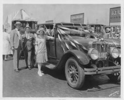 People Standing Near Automobile