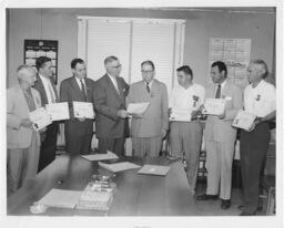 N. Emerson Paton Presenting Certificates