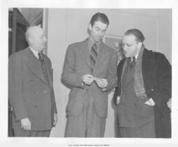 James Stewart Standing between Two Men