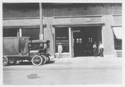 Men Standing near Auto Repair Shop