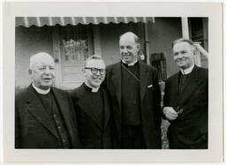 Father Edwin W. Merrill, Father Charles Cooper, Bishop Edward R. Welles, and Unidentified Seminarian