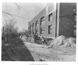 Men Working on Unidentified Building