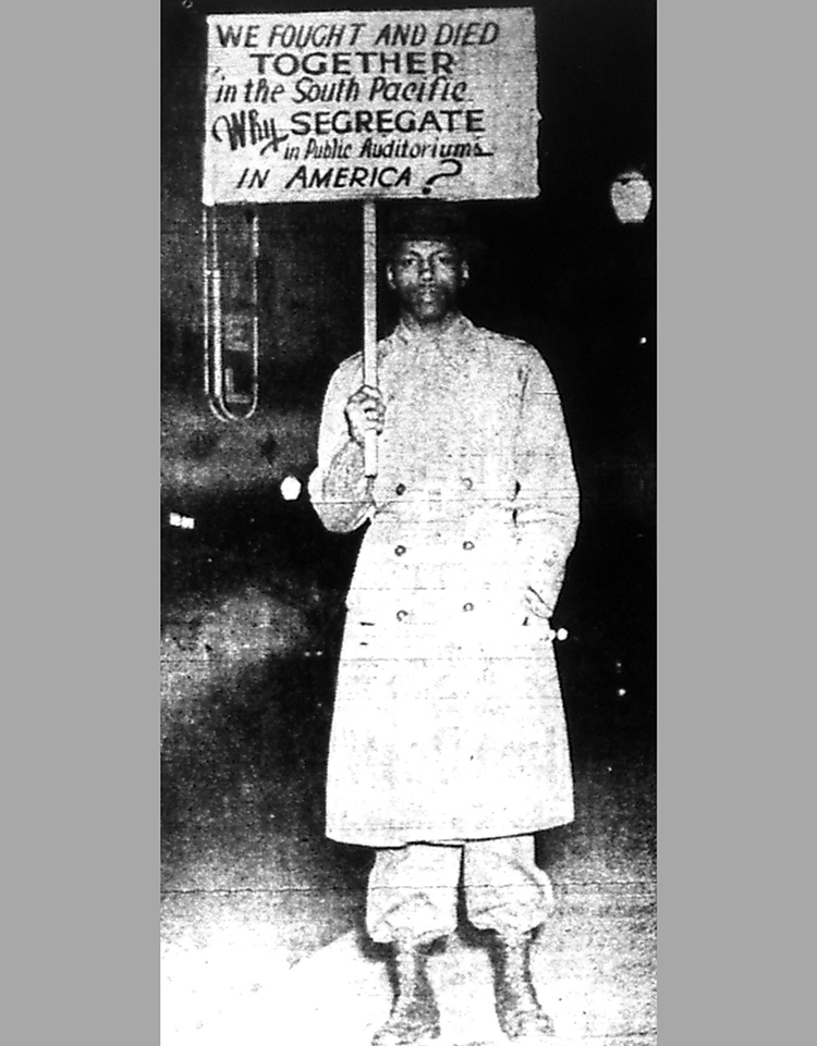 Boxer Leroy Jeffries protesting the Golden Gloves tournament held at Municipal Auditorium in February 1947. Jeffries was one of many Black World War II veterans who were dissatisfied with segregation in publicly funded venues and organizations after returning home. THE CALL