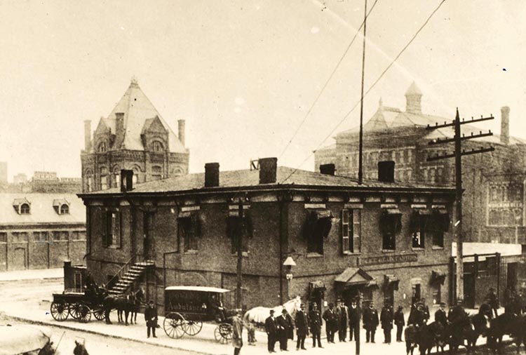 The first City Hall at 5th and Main.