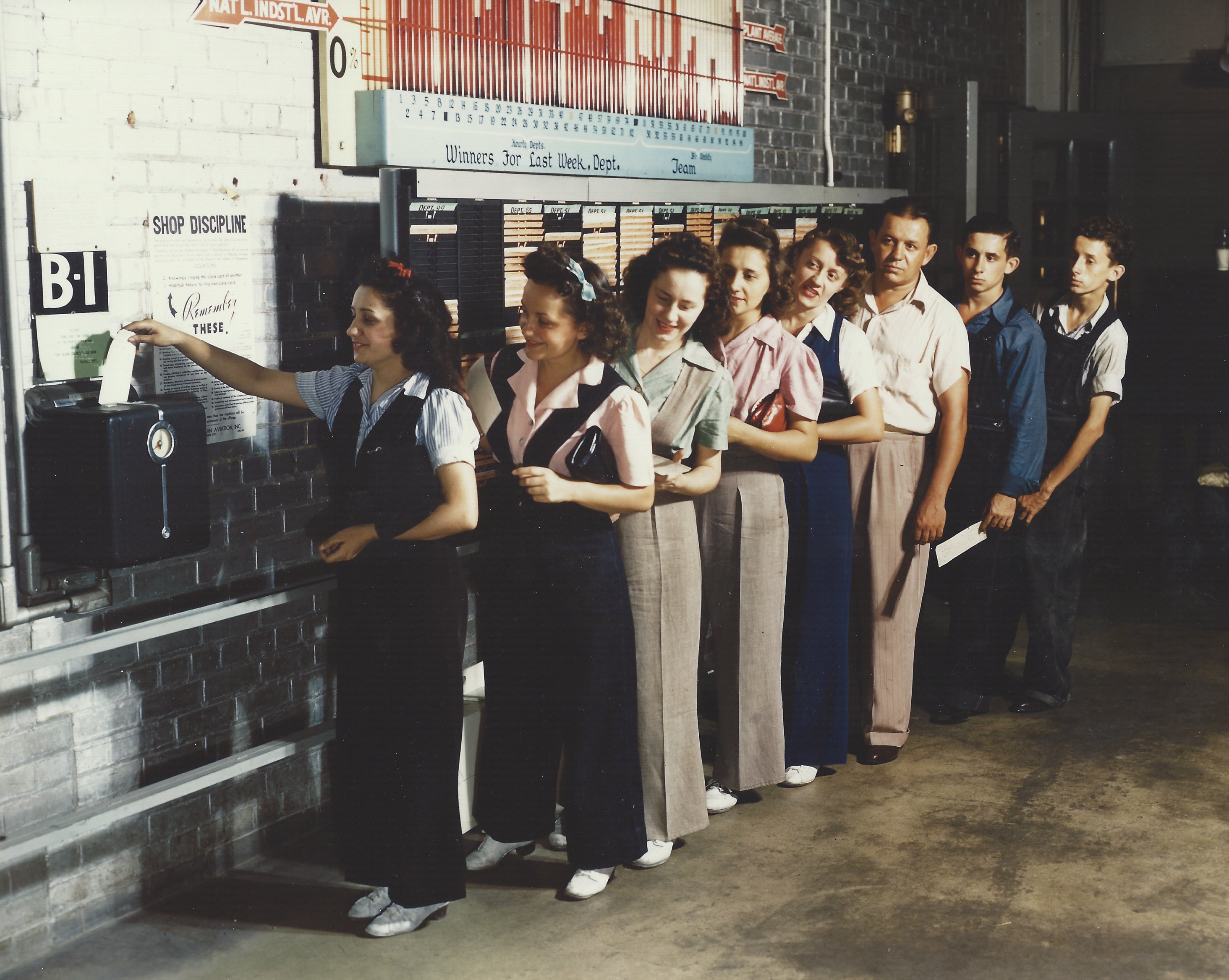 North American Aviation workers punching the clock. JODY VALET