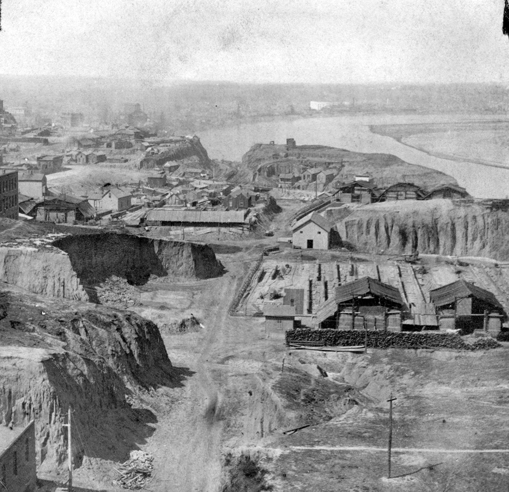 An 1878 view of the riverfront area facing west and showing the massive street grading project that helped draw Irish immigrants to Kansas City