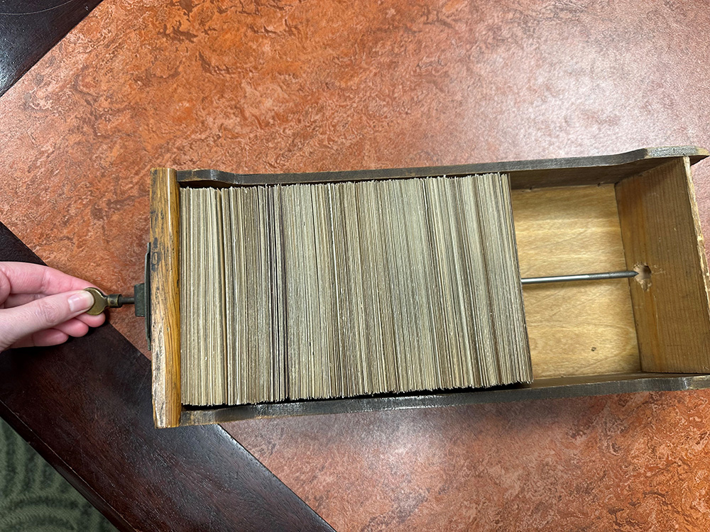 The inside of a card catalog drawer.