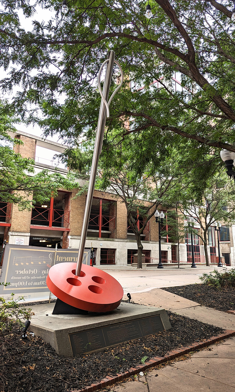 Needle and Button Sculpture memorializing the former Kansas City Garment Industry and its workers, 2022. Sarah Biegelsen