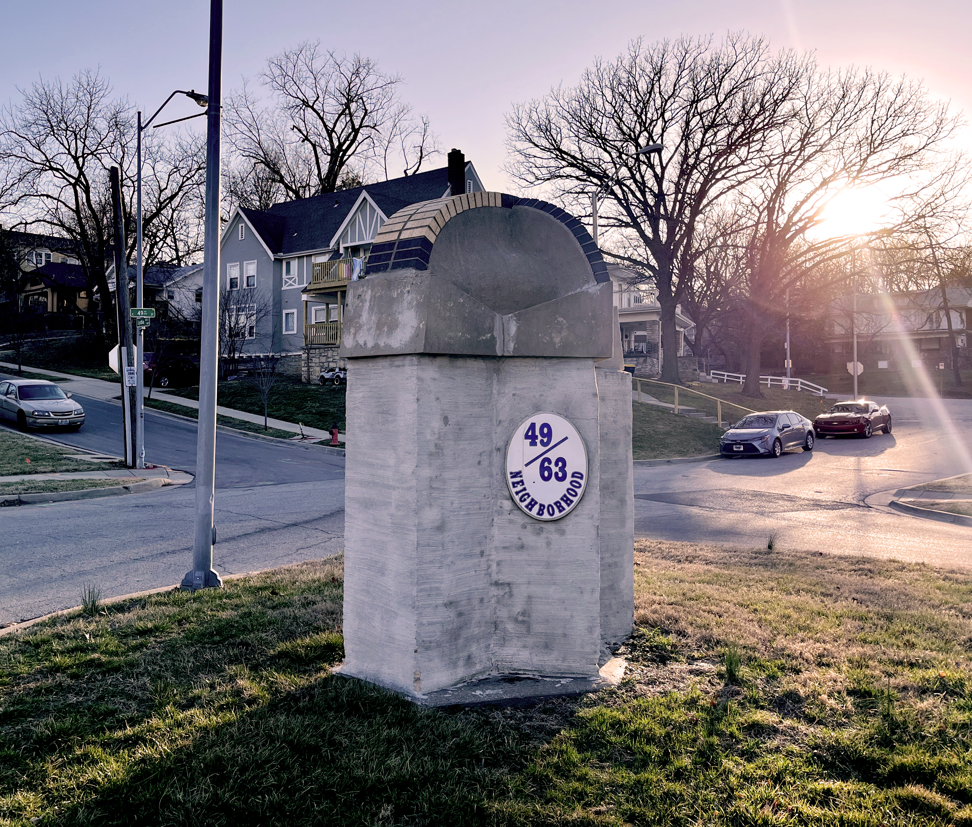 The 49/63 Neighborhood marker at 49th Street and The Paseo.