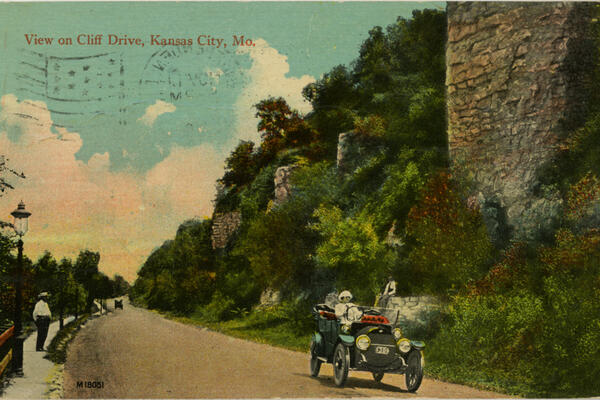 Postcard of a picturesque road next to a bluff