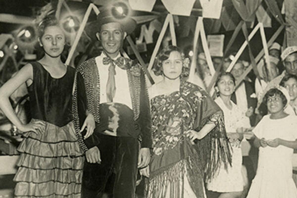 Group of people in traditional Mexican attire