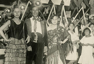 Group of people in traditional Mexican attire