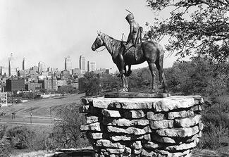 Statue of a Native American person on horseback