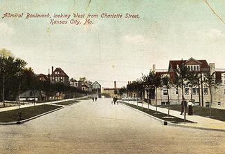 Color illustrated postcard of a street scene